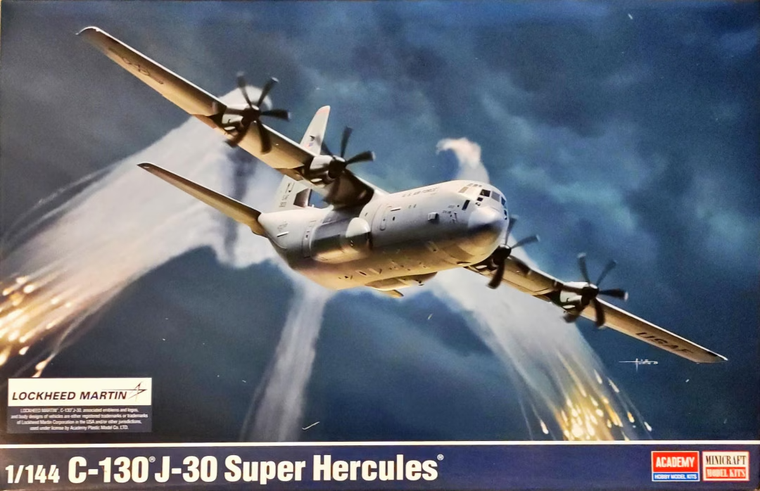Box art of the Academy 1:144 scale model kit for the US C-130J Super Hercules, showing the modern four-engine turboprop aircraft in flight with detailed markings.